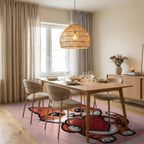 Adorable Orange Tabby Holding Red Heart Rug Dining Room View
