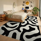 Black Cream Organic Swirl Rug - Bedroom View
