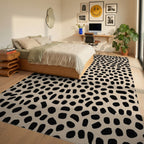 Black Spots On Beige Background Rug - Bedroom View