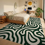 Curved Dark Green Cream Pattern Rug Bedroom View