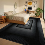 Deep Black White Concentric Squares Rug - Bedroom View