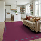 Deep Plum Geometric Border Rug Living Room View