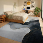 Gray Gold Fluid Abstract Rug Bedroom View