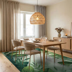 Lush Tropical Foliage Green Border Rug - Dining Room View