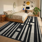 Monochromatic Geometric Stripe Arrangement Rug Bedroom View