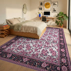 Ornate Pink Floral Black Border Rug - Bedroom View