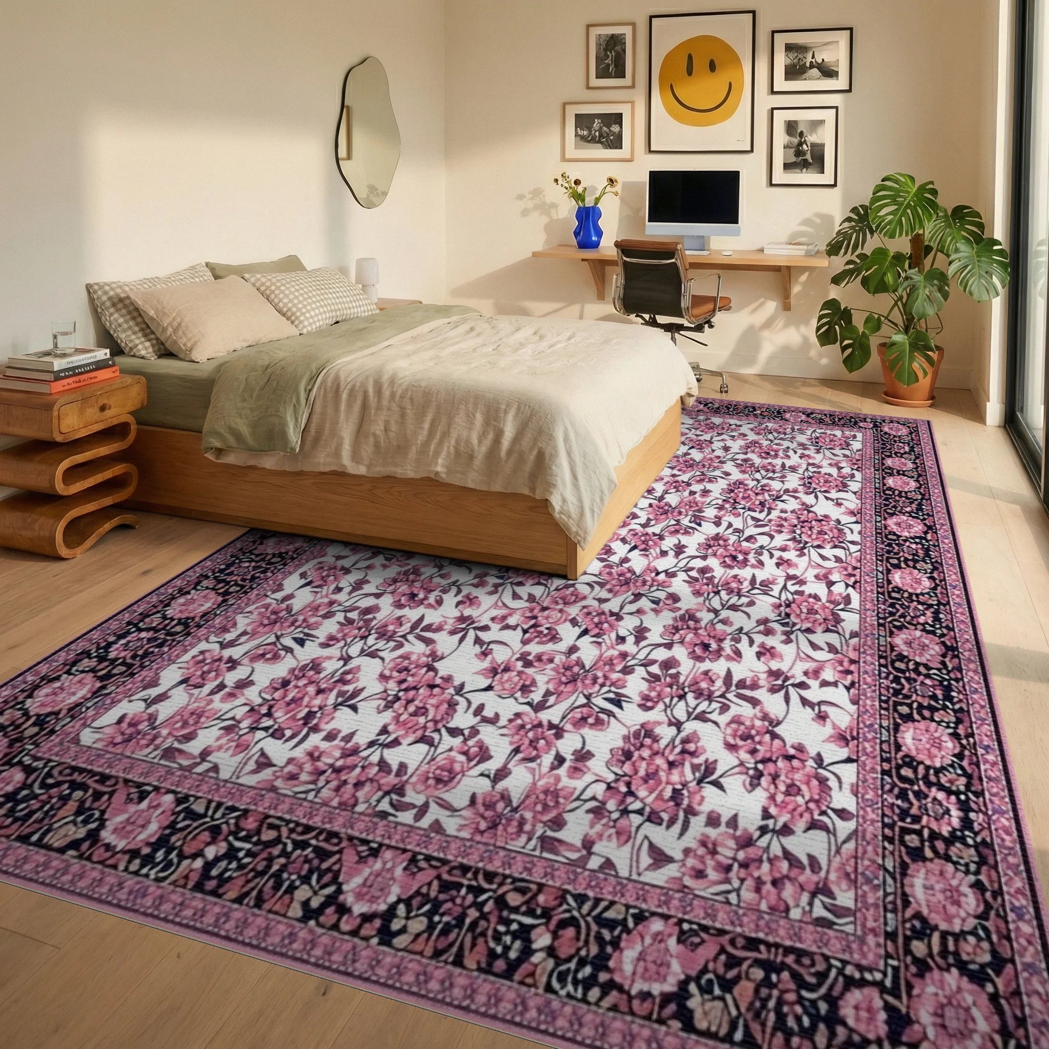 Ornate Pink Floral Black Border Rug - Bedroom View