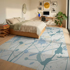 Soft Blue Splatter Paint Abstract Rug Bedroom View