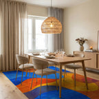 Vibrant Blue Orange Wavy Flow Rug - Dining Room View