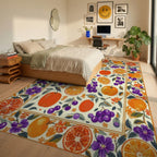 Vibrant Citrus Grape Floral Border Rug Bedroom View